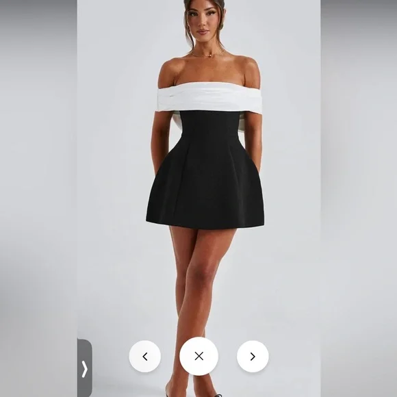 Elegant Black Women's Dress with White Bow
Small & Medium Available - Picture 1 of 8